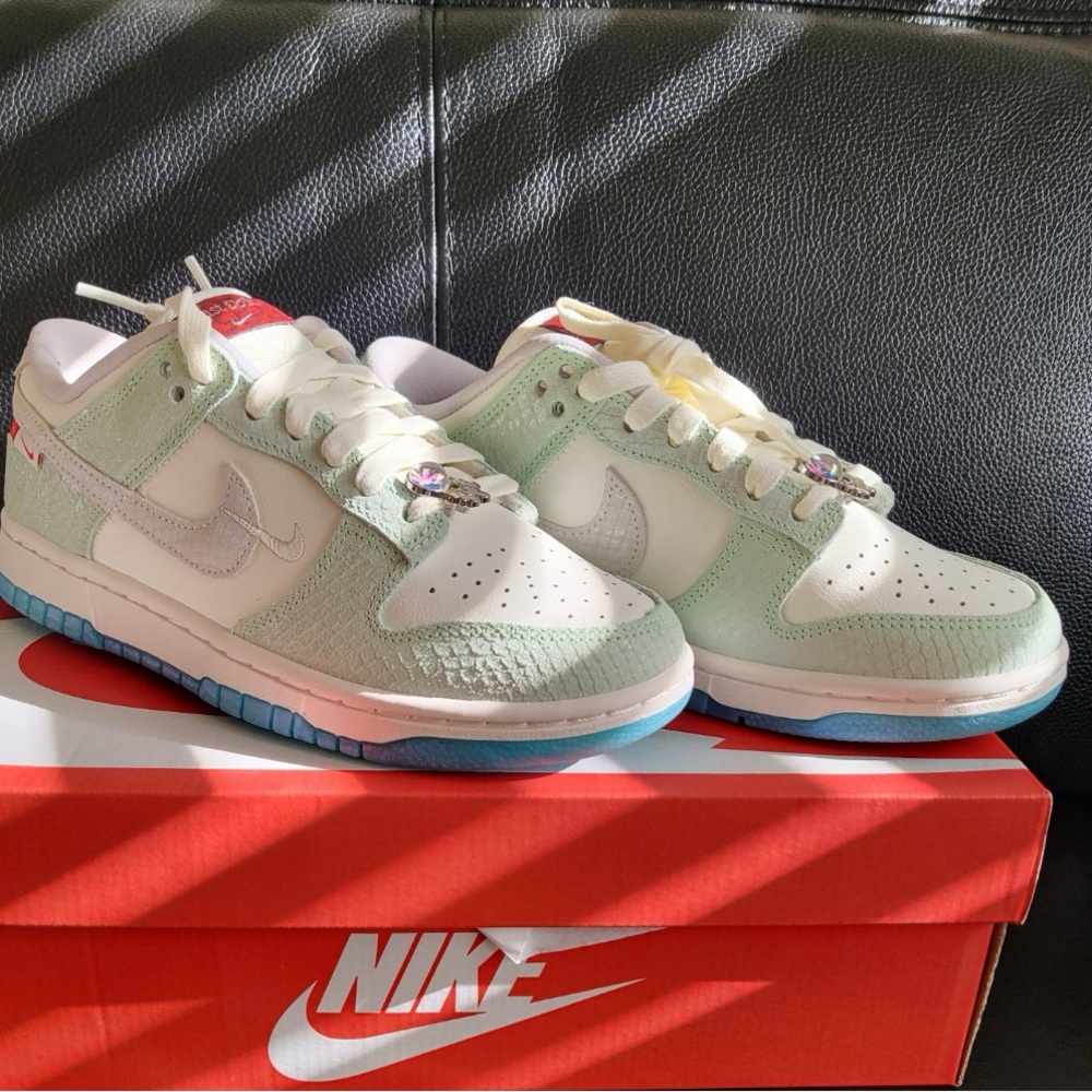 Nike dunks year of the dragon shoes.